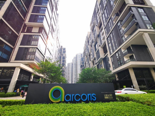 Arcoris Residence entrance and towers